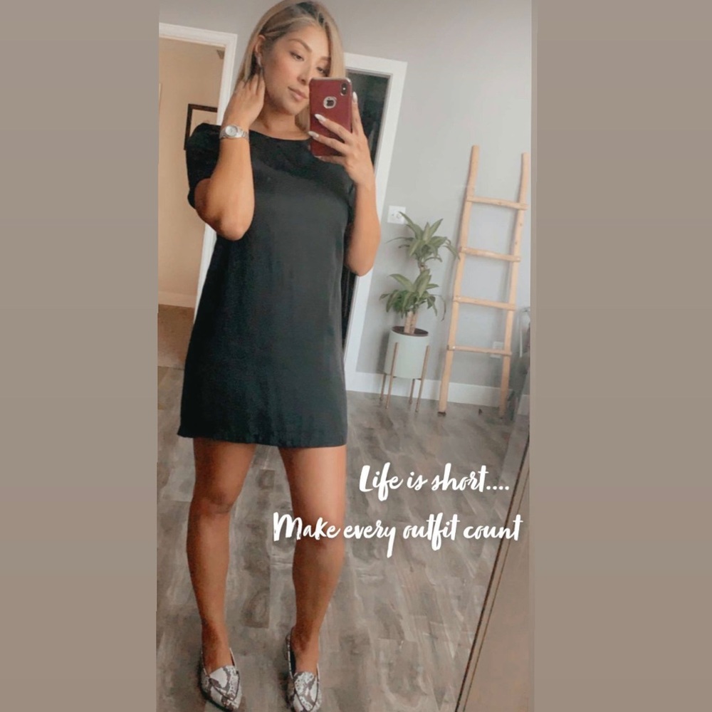 Silky black mini dress with zip up back detail